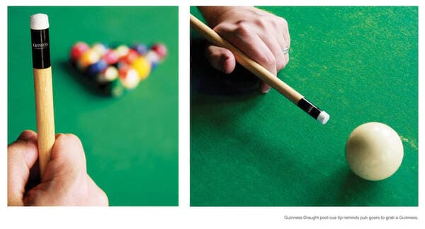 billiard cues with guinness branding